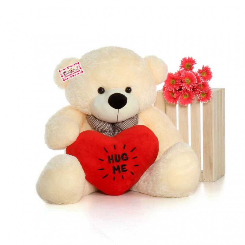 teddy bear hugging a heart